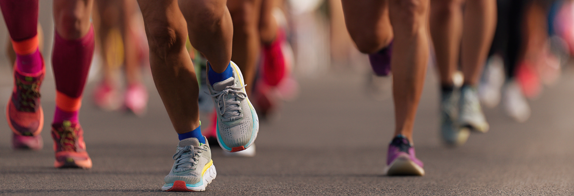 Image of people's feet running during the 18 Mile Run